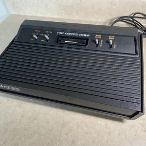 A photo of the Turkish-made Atari 2600, which is the all-black "Vader" model -- the design at the time in early 1984. Nothing on the outside distinguishes it as being different from a normal Atari 2600 apart from the label on the back, not pictured in this photo.