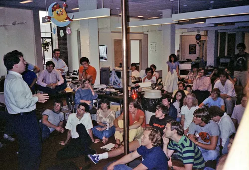 The GCC team having a &ldquo;fire pole&rdquo; meeting. Noelie Alito is third from the left of those seated on the floor. Photo from former GCC employee Steve Szymanski&rsquo;s archive.